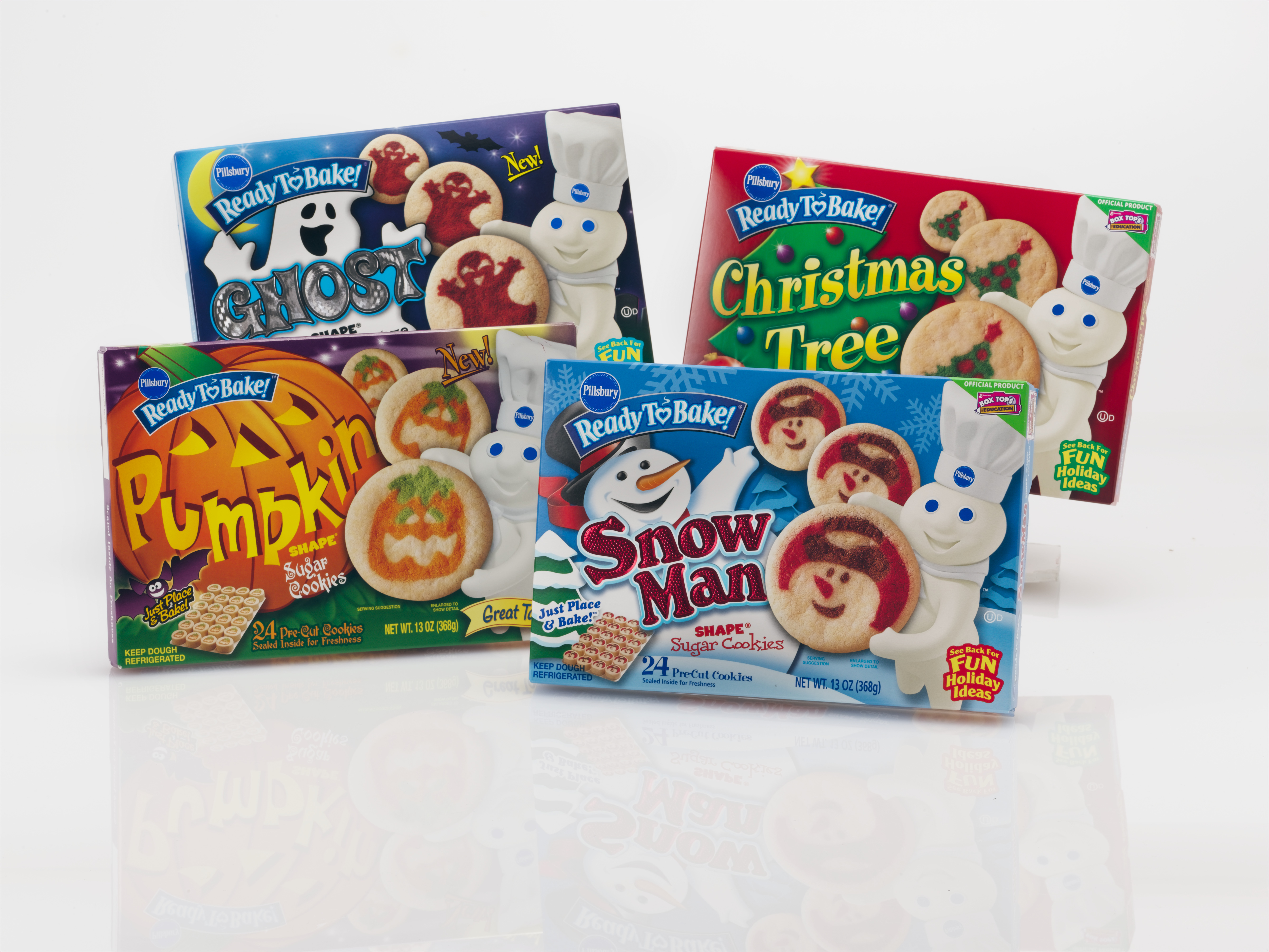 A collection of Pillsbury Ready-to-Bake Shape Cookies including Pumpkin and Snow Man